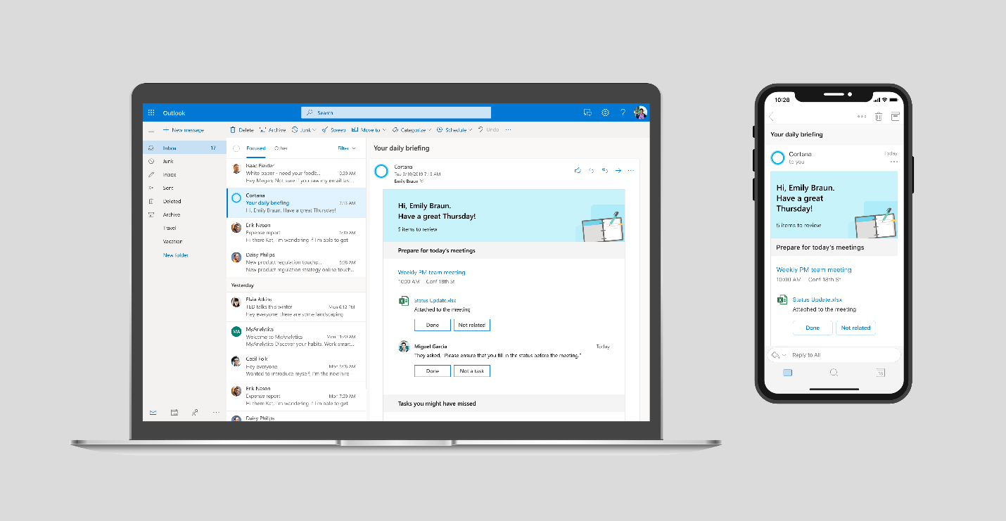 E-Mail Programm Microsoft Outlook auf einem Laptop und einem Smartphone